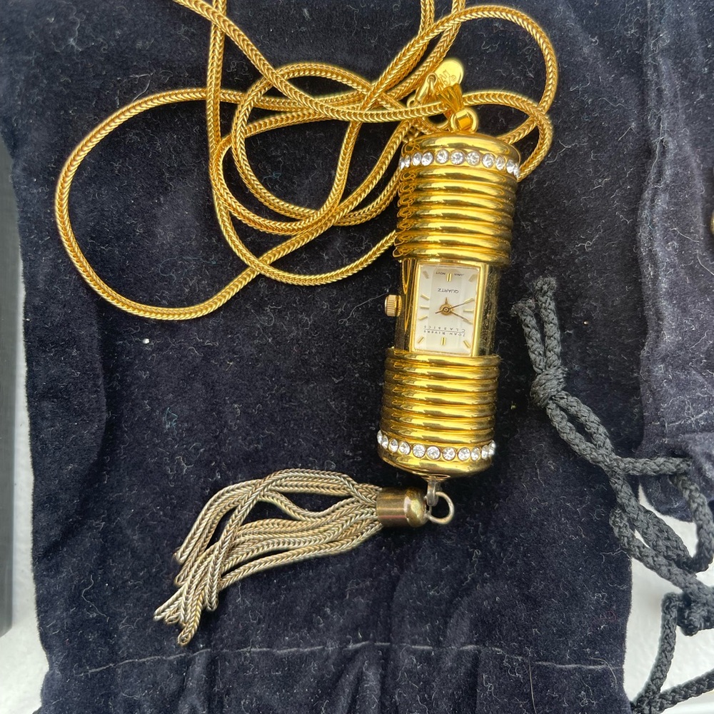 Tassel hidden watch pendant Joan Rivers